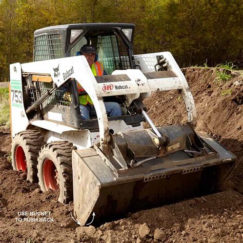 best way to get skid steer unstuck|skid steer unstuck bucket.